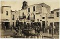 Veduta di una piazza con fontana