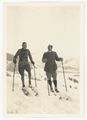 Megève, due uomini con sci